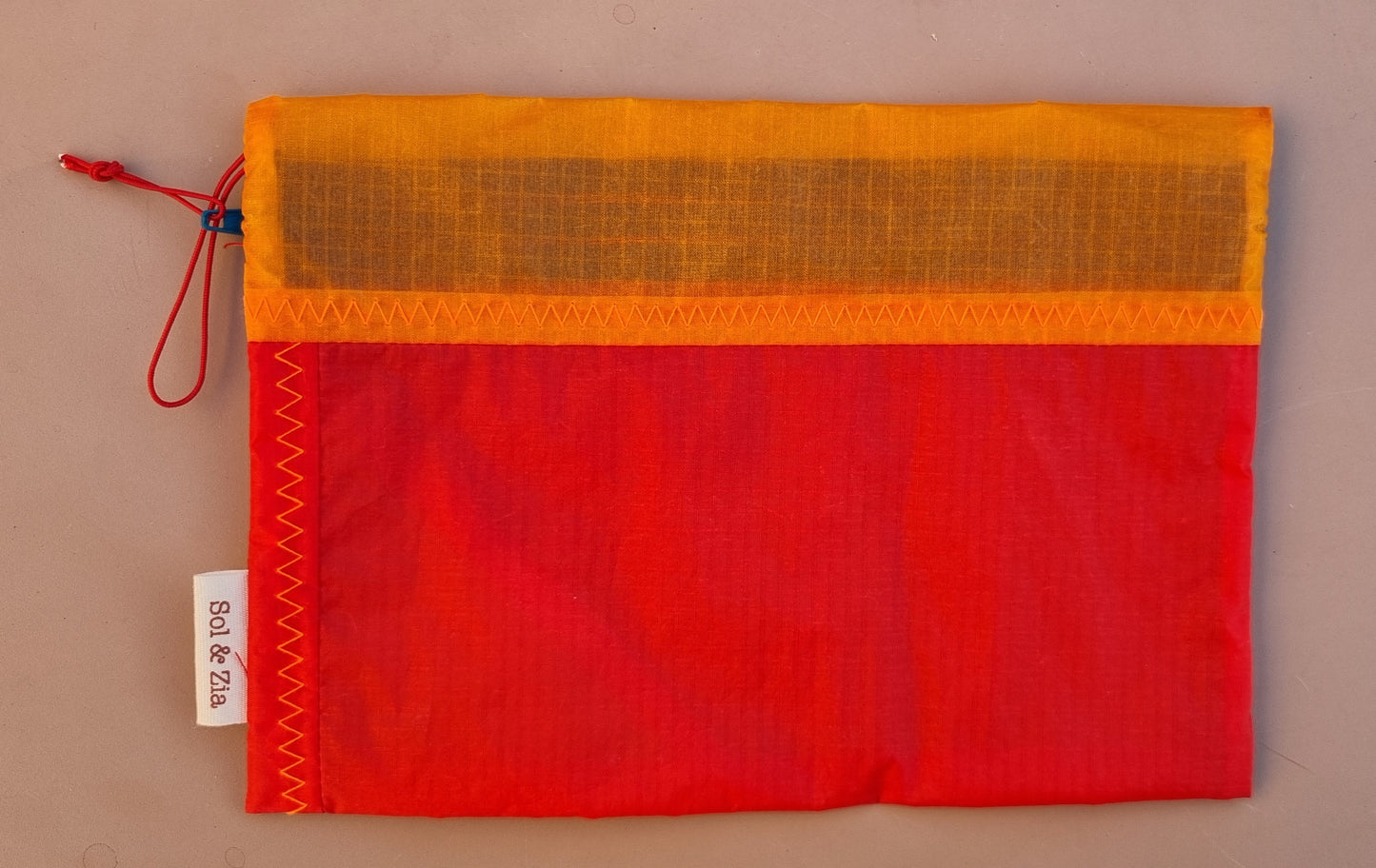 Pochette noire orange rouge